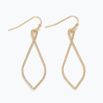 Gold teardrop earrings on a white background. Available at Be Charmed
