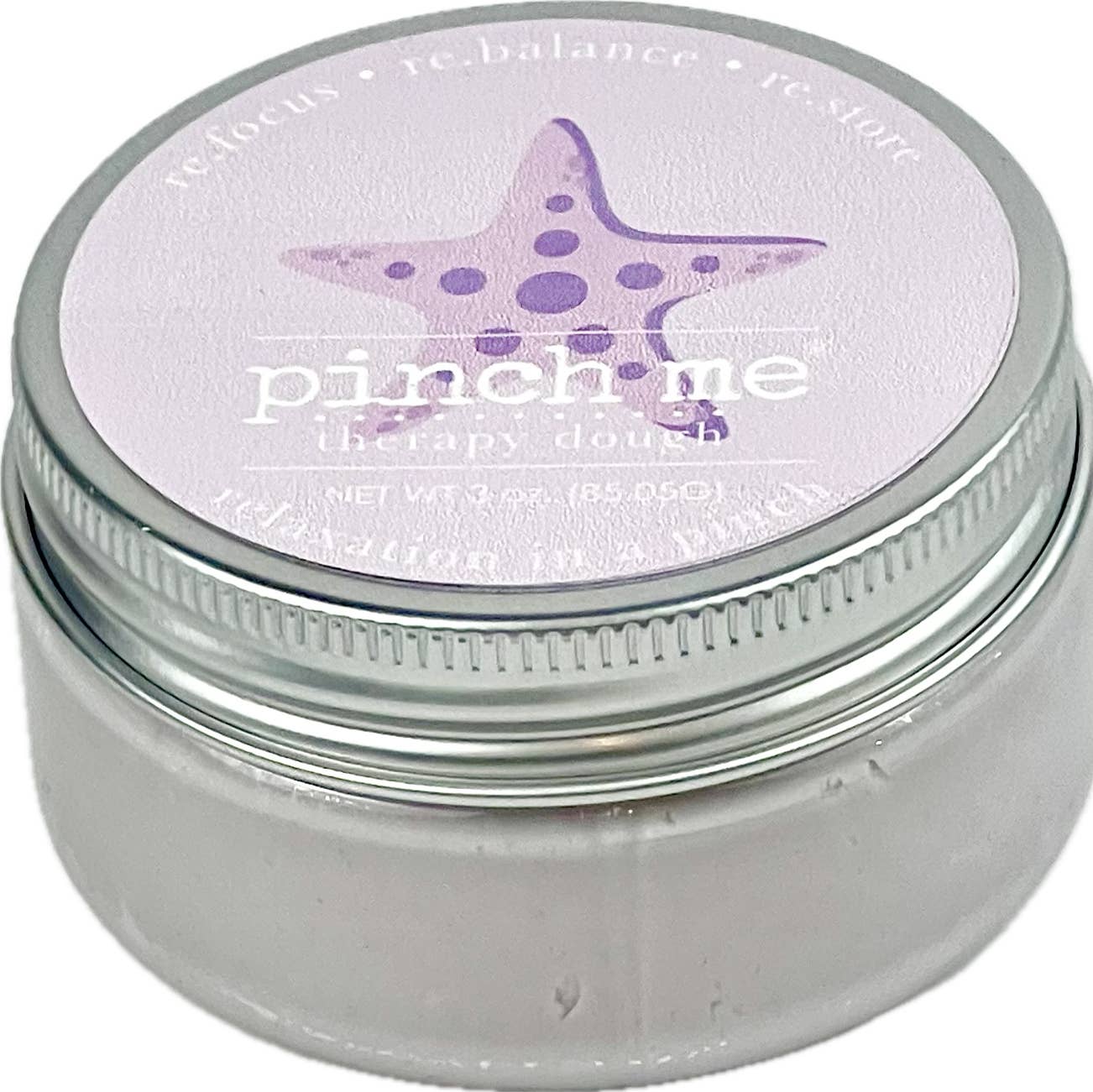 Jar of 'pinch me' therapy dough with a purple starfish design on the lid. Available at Be Charmed