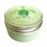 Green jar of 'pinch me' therapy dough with turtle design on lid. Available at Be Charmed