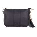 Black Pom Pom London City Slim Bag – handcrafted leather crossbody with sleek design and adjustable strap. Designed in London. Available at Be Charmed.