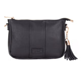 Black Pom Pom London City Slim Bag – handcrafted leather crossbody with sleek design and adjustable strap. Designed in London. Available at Be Charmed.