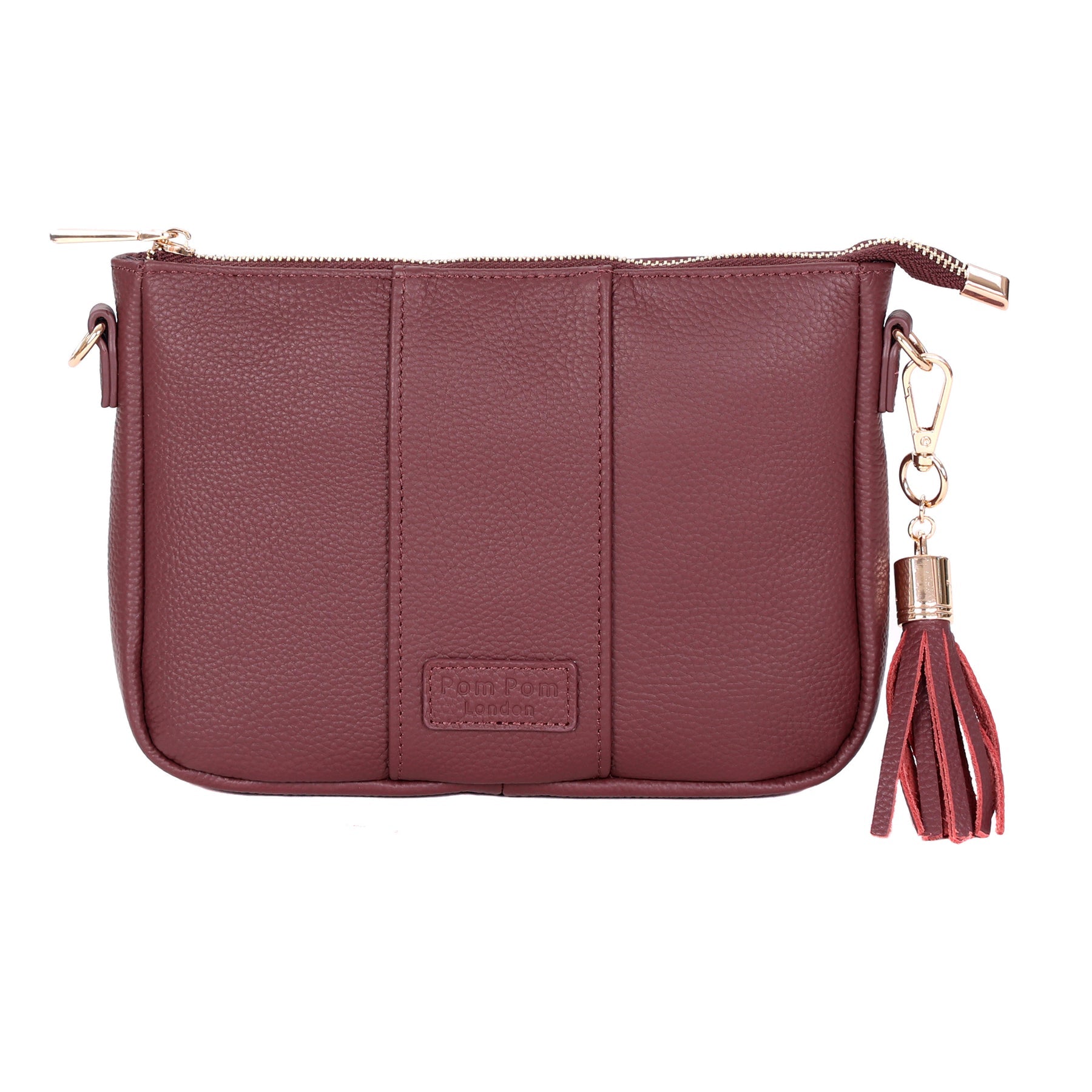 Deep Burgundy Pom Pom London City Slim Bag – handcrafted leather crossbody with sleek design and adjustable strap. Designed in London. Available at Be Charmed.