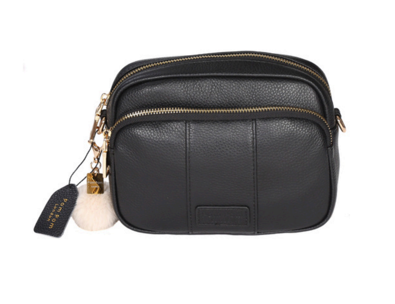 Black Pom Pom London Original Bag – classic handcrafted leather crossbody with adjustable and interchangeable straps. Available at Be Charmed.