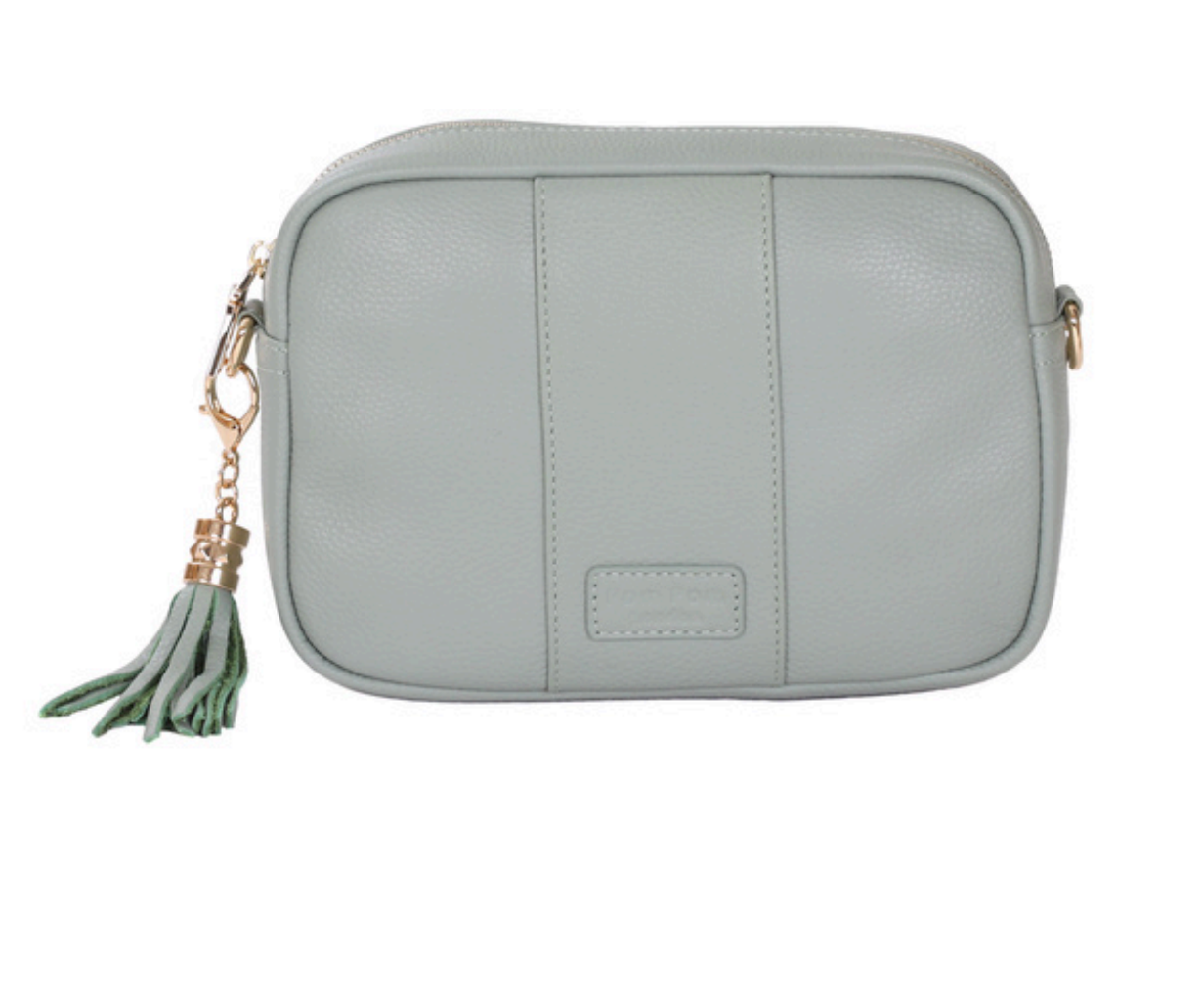 Mint Pom Pom London City Bag – handcrafted leather crossbody with interchangeable straps and London-inspired design. Available at Be Charmed.
