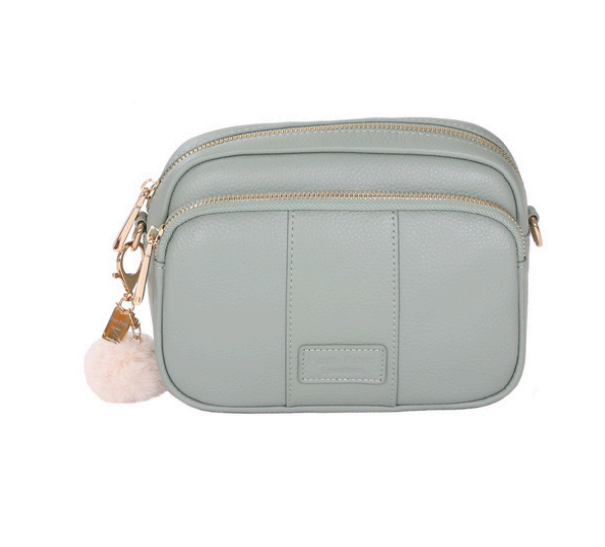 Mint Green Pom Pom London Original Bag – classic handcrafted leather crossbody with adjustable and interchangeable straps. Available at Be Charmed.