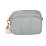 Mint Green Pom Pom London Original Bag – classic handcrafted leather crossbody with adjustable and interchangeable straps. Available at Be Charmed.