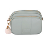 Mint Green Pom Pom London Original Bag – classic handcrafted leather crossbody with adjustable and interchangeable straps. Available at Be Charmed.