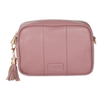 Rose Pom Pom London City Bag – handcrafted leather crossbody with interchangeable straps and London-inspired design. Available at Be Charmed.