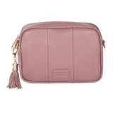 Rose Pom Pom London City Bag – handcrafted leather crossbody with interchangeable straps and London-inspired design. Available at Be Charmed.