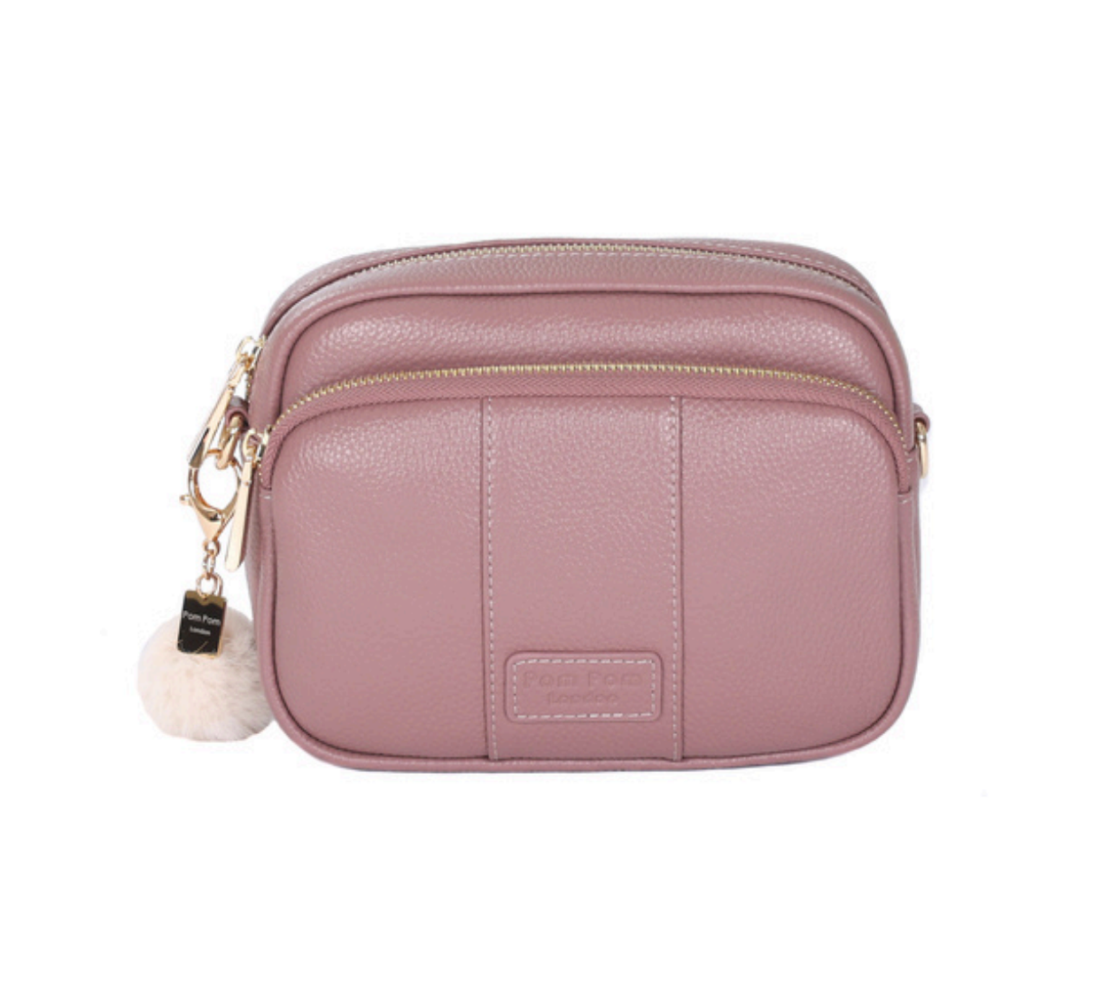 Wood Rose Pom Pom London Original Bag – classic handcrafted leather crossbody with adjustable and interchangeable straps. Available at Be Charmed.