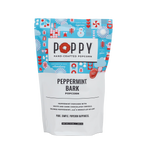 Poppy hand-crafted popcorn peppermint bark packaging on a white background. Available at Be Charmed.