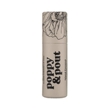 Island Coconut Lip balm container with 'Poppy & Pout' branding. Available at Be Charmed