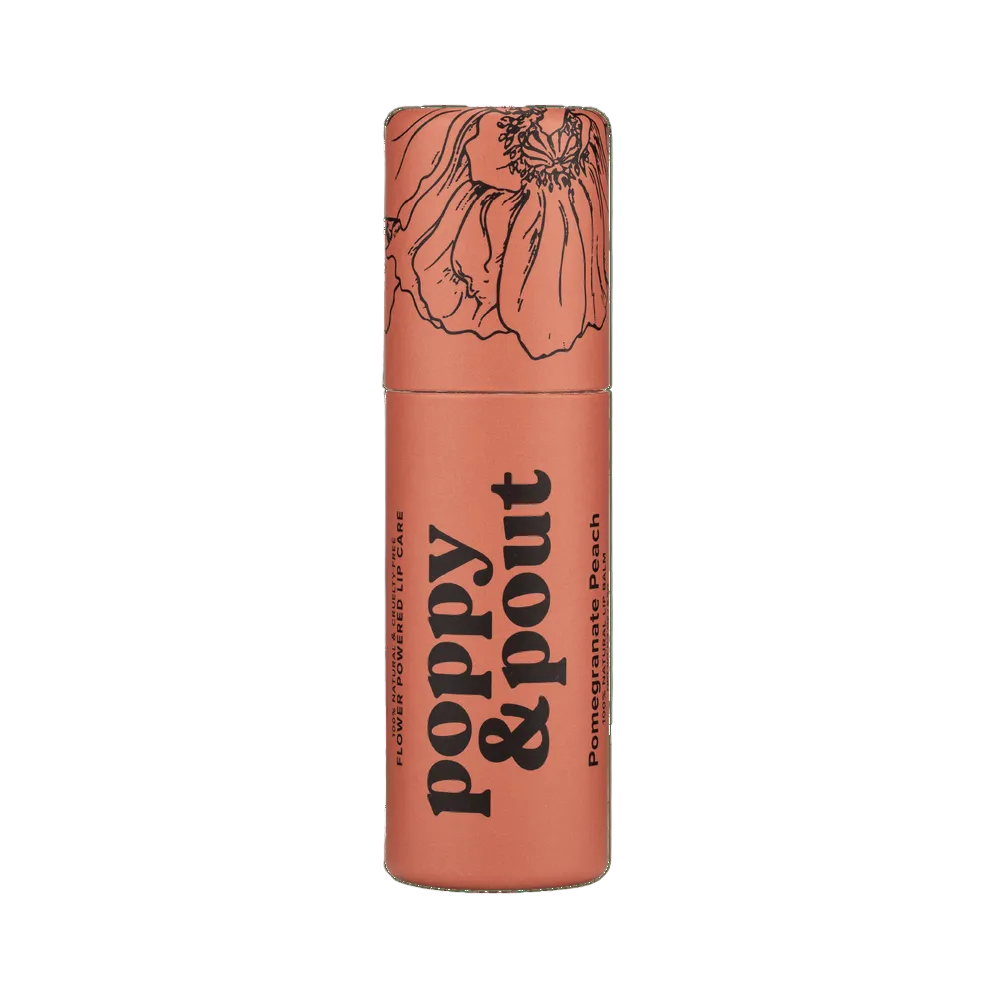 Pomegrante Peach Lip balm container with 'Poppy & Pout' branding. Available at Be Charmed