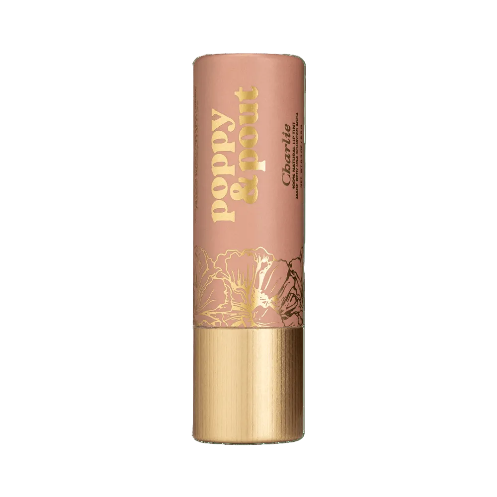  Poppy & Pout Charlie Lip balm with gold text and floral design on a background. Available at Be Charmed
