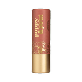  Poppy & Pout Debbie Lip balm with gold text and floral design on a background. Available at Be Charmed