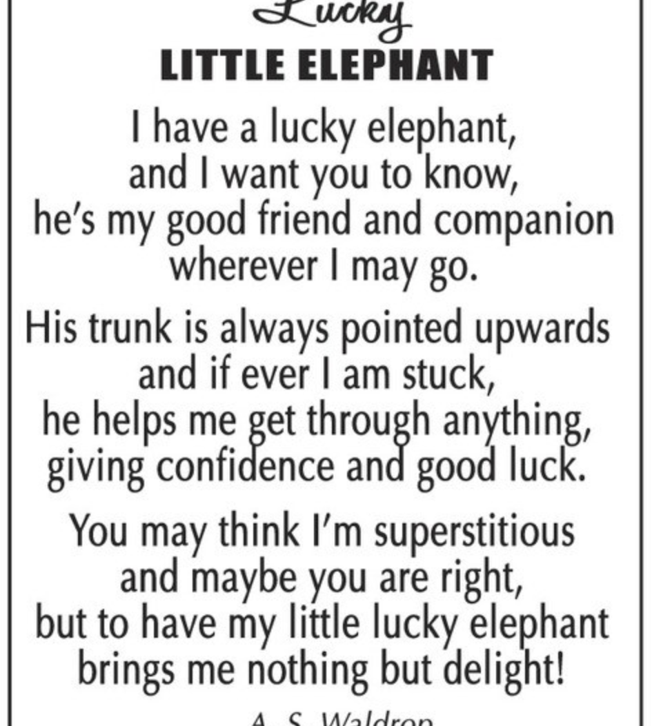 Product card for a small silver-tone Ganz elephant pocket token with an upward-pointing trunk and a printed story card.