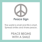 Product card for Lola silver peace sign pendant necklace with classic symbolic design, meaningful everyday jewelry, Available at Be Charmed
