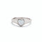 A silver-colored Pura VIda signet ring with a heart-shaped white opal stone set in the center. Available at Be Charmed