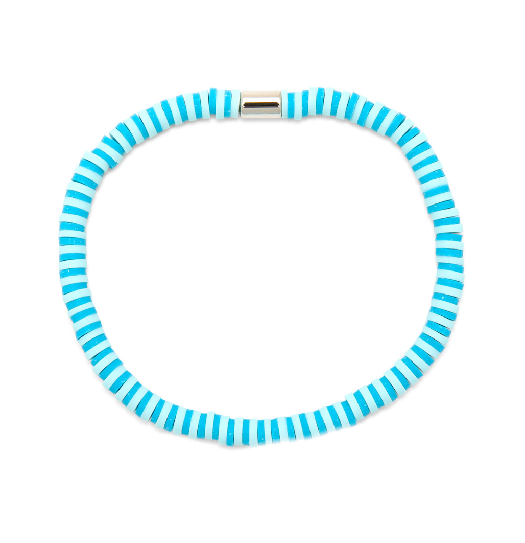 A blue and white striped Pura Vida stretch bracelet with a vinyl disc in the center. Available at Be Charmed