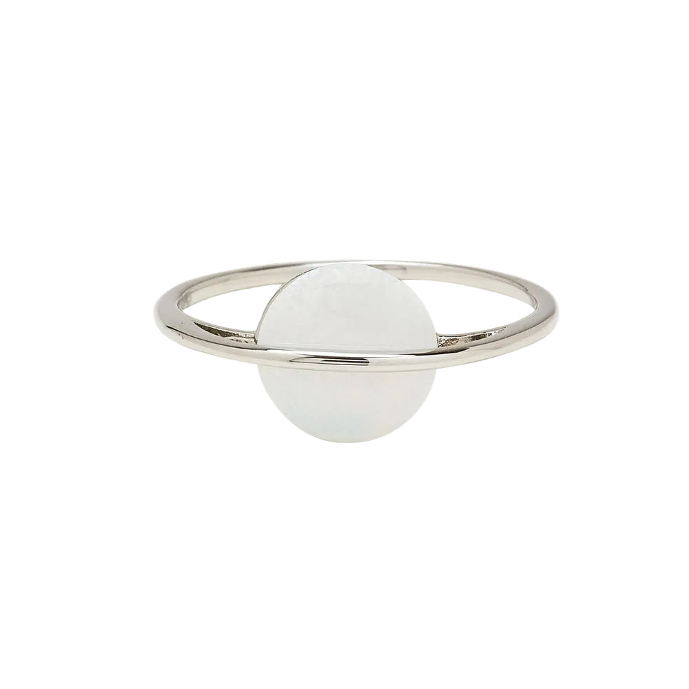 A Pura Vida silver ring with a white opal stone in the center, with a brass base and white rhodium plating. Available at Be Charmed