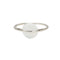 A Pura Vida silver ring with a white opal stone in the center, with a brass base and white rhodium plating. Available at Be Charmed
