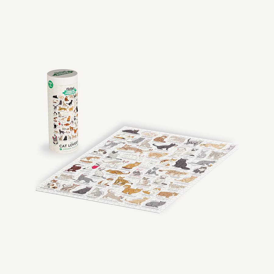 Cat Lover’s 1000-Piece Jigsaw Puzzle by Ridley’s Games – vibrant illustrated puzzle featuring over 50 cat breeds and feline facts, perfect for cat lovers and puzzle enthusiasts, available at Be Charmed.