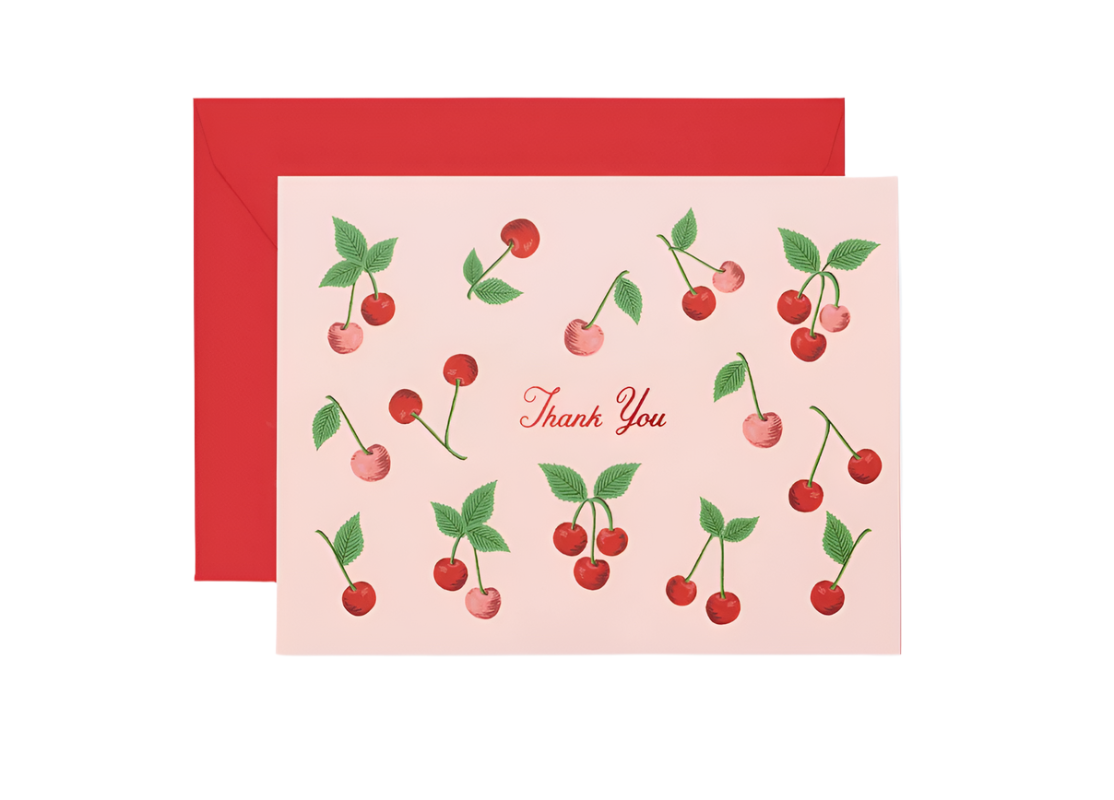 A boxed set of Rifle Paper Co thank you cards with a cherries design, including a red envelope. Available at Be Charmed