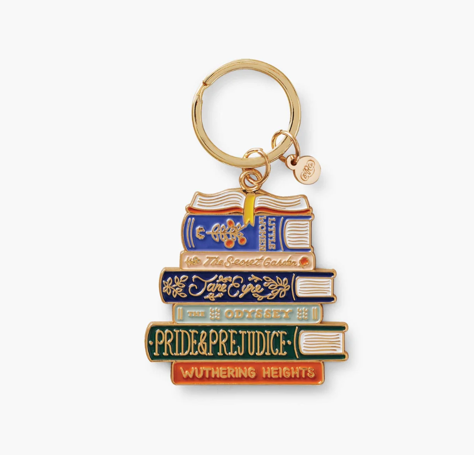 Keychain with book stack design on a white background. Available at Be Charmed