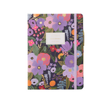 A hardcover journal with a floral pattern and a gold band where the title 'JOURNAL' is written. Available at Be Charmed
