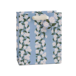 Floral-patterned gift bag on a white background. Available at Be Charmed