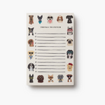 Notepad with dog illustrations and text on a white background. Available at Be Charmed