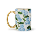 Mug with floral design and gold handle on a white background.  Available at Be Charmed