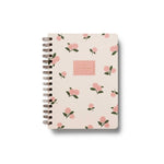 Notebook with floral pattern on a white background. Available at Be Charmed