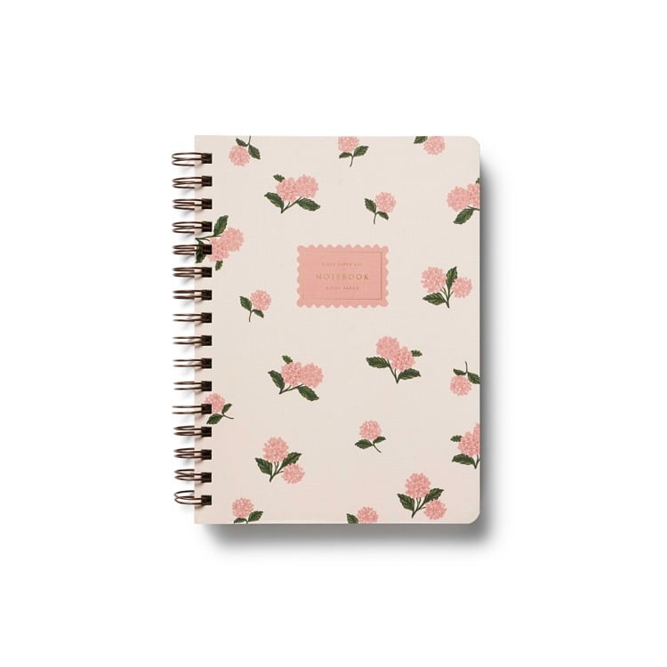 Notebook with floral pattern on a white background. Available at Be Charmed