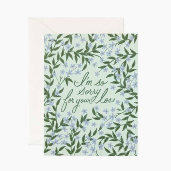 Card with floral design and 'I'm so sorry for your loss' text on a light green background. Avaiable at Be Charmed