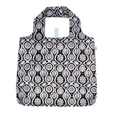 Black and white patterned reusable shopping bag on a white background. Available at Be Charmed