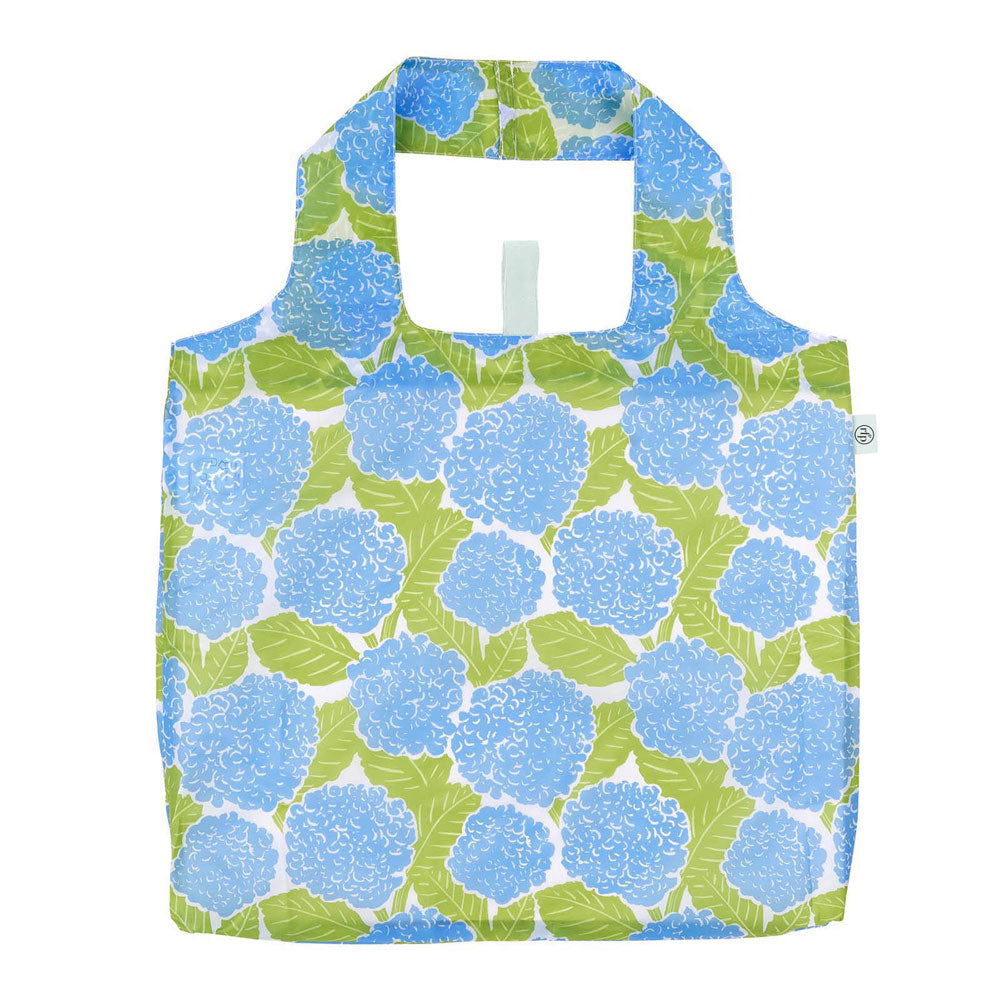 Rock Flower Paper Blue Hydrangea Reusable shopping bag with blue floral pattern on a white background. Available at Be Charmed