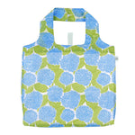 Rock Flower Paper Blue Hydrangea Reusable shopping bag with blue floral pattern on a white background. Available at Be Charmed