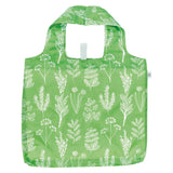 Green reusable bag with white floral pattern on a white background. Available at Be Charmed