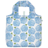 Reusable shopping bag with blue floral pattern on a white background. Available at Be Charmed