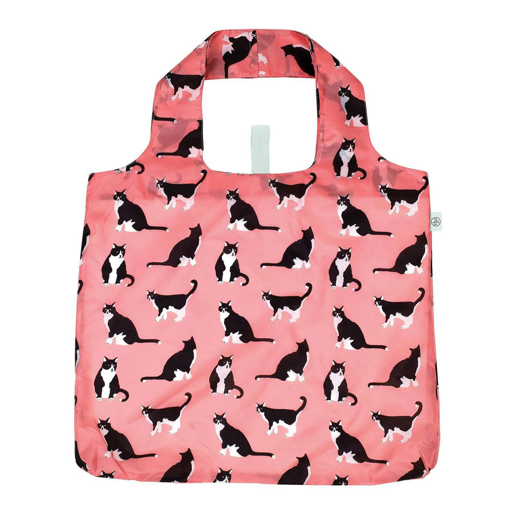 Pink tote bag with black cat pattern on a white background. Available at Be Charmed