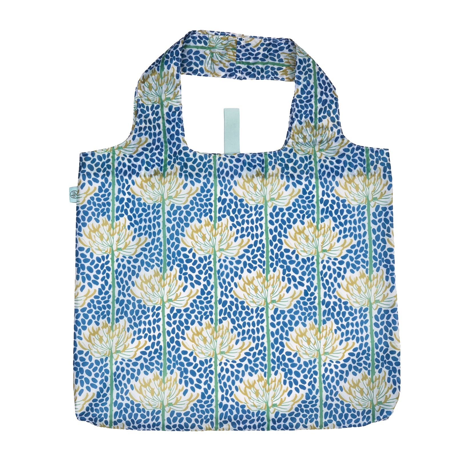 A reusable fabric tote bag with a blue background, covered in a pattern of white water lilies with green stems and vertical blue speckled stripes. Available at Be Charmed