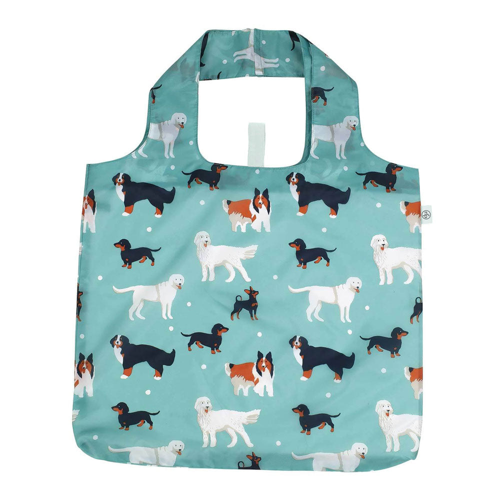 Foldable shopping bag with dog pattern on a teal background. Available at Be Charmed