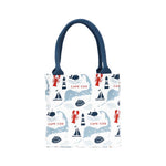 Small bag with nautical pattern featuring boats, lobsters, and 'Cape Cod' text on a white background. Available at Be Charmed