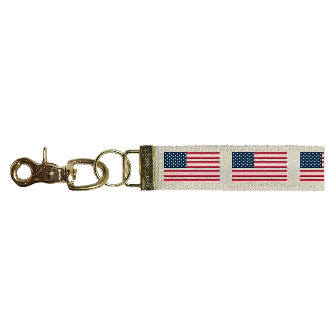 Rustic Marlin 50 Stars Flag Keychain featuring a handcrafted American flag design, perfect for patriotic displays. Available at Be Charmed.