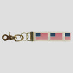 Rustic Marlin 50 Stars Flag Keychain featuring a handcrafted American flag design, perfect for patriotic displays. Available at Be Charmed.