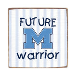 Blanket with 'Future Warrior' text and blue letter 'M' on a striped background Available at Be Charmed