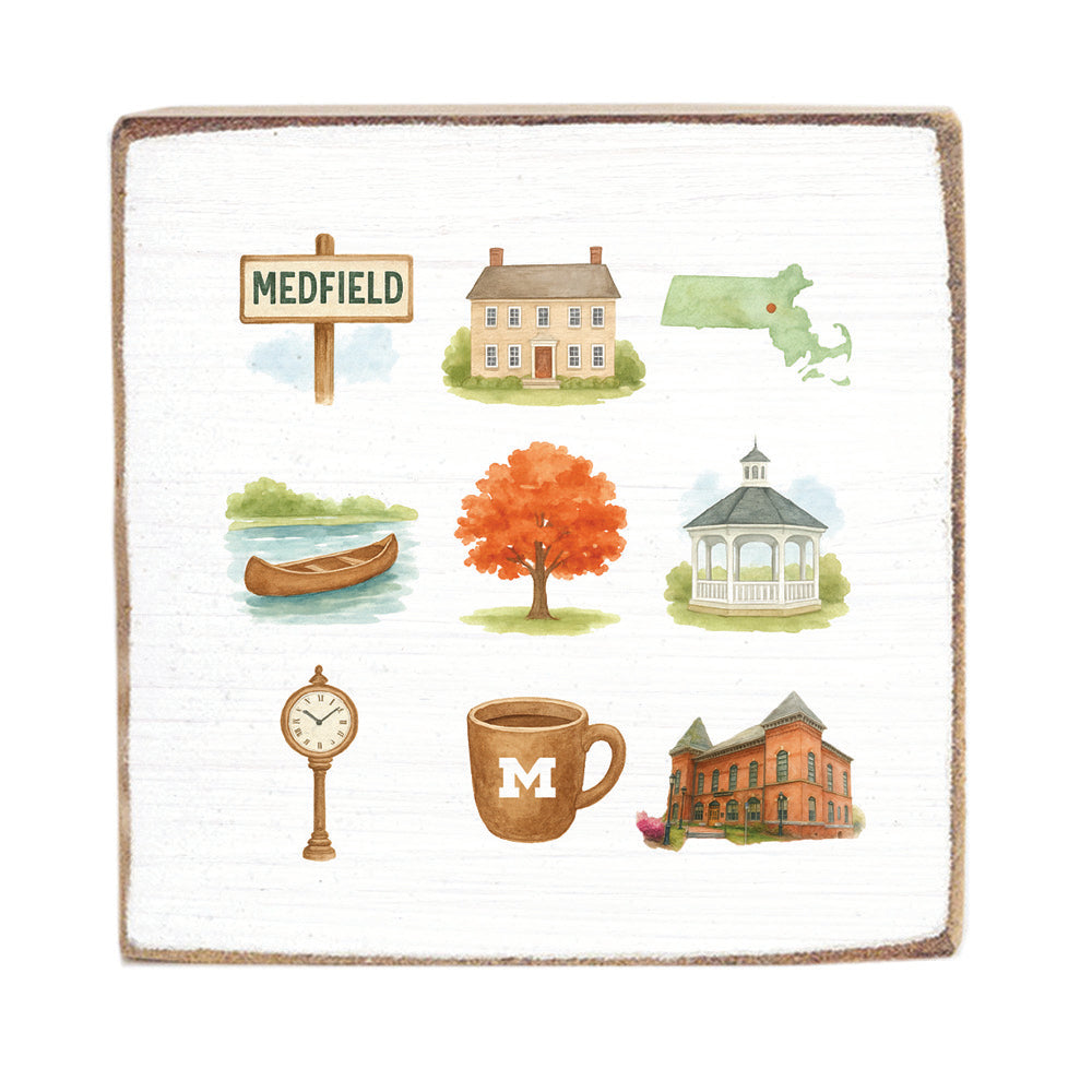 Decorative blanket with illustrations of a town scene, including buildings, a clock, and a cup. Available at Be Charmed