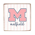 Wooden Block with a large pink 'M' and the word 'Medfield' on a striped background. Available at Be Charmed