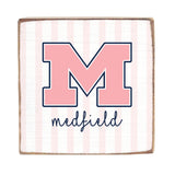Wooden Block with a large pink 'M' and the word 'Medfield' on a striped background. Available at Be Charmed